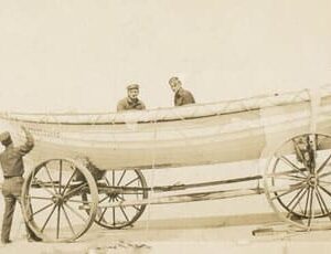 32045. (photo) U.S. Coast Guardsmen Working on Surfboat c.1917.