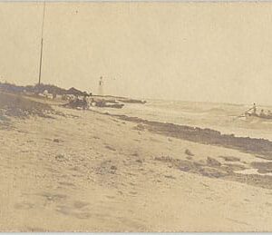 1279. (photo) Life-Savers Launch Surfboat Near Lighthouse c.1900.